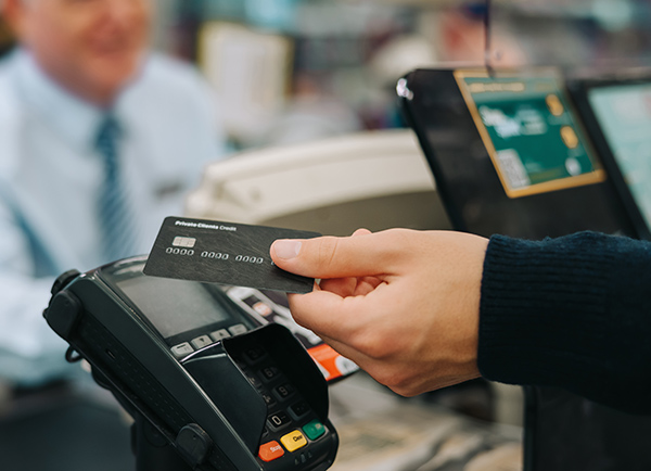 Processing card at a POS terminal.