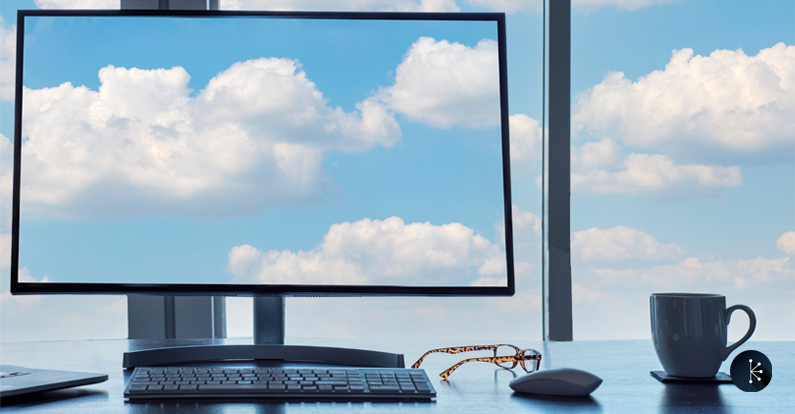 Mariner - Cybersecurity Awareness Month - Conceptual cloud computing desk with computer, keyboard, mouse, eyeglasses and coffee.